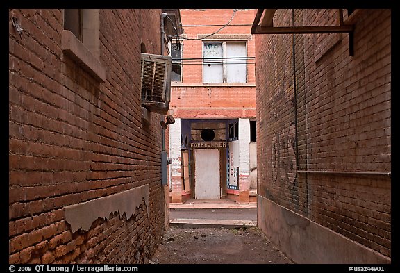 Alley and boarded-up store, Clifton. Arizona, USA