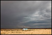 Trailer and storm sky. Arizona, USA