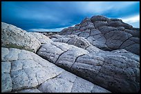 Buttes with crossbeded white sandstone layer, evening. Vermilion Cliffs National Monument, Arizona, USA ( color)