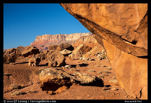 Overhanging boulder and cliffs. Vermilion Cliffs National Monument, Arizona, USA