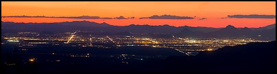 Tucson lights at sunset from Rincon Mountains. Tucson, Arizona, USA (Panoramic color)