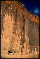 White House Ancestral Pueblan ruins and wall with desert varnish and corner of sky. Canyon de Chelly  National Monument, Arizona, USA