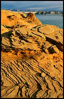 Sandstone Swirls and Lake Powell, Glen Canyon National Recreation Area, morning, Glen Canyon National Recreation Area, Arizona. USA