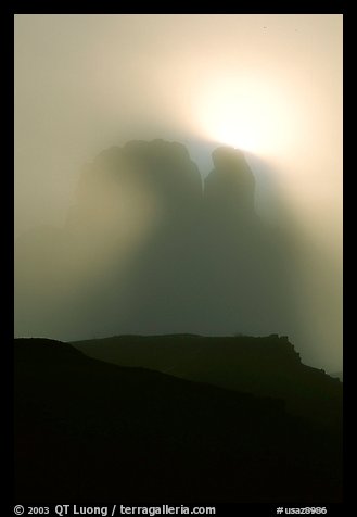 Butte in fog. Monument Valley Tribal Park, Navajo Nation, Arizona and Utah, USA