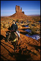 Horseback riding. Monument Valley Tribal Park, Navajo Nation, Arizona and Utah, USA (color)