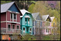 Houses with pastel colors and newly leafed trees. Telluride, Colorado, USA (color)