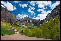 Road, aspens and Ajax peak in spring. Telluride, Colorado, USA