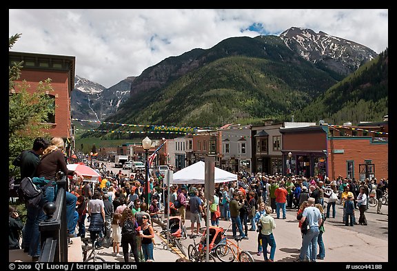 Crowds gather on main street during ice-cream social. Telluride, Colorado, USA