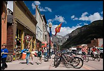 Children walking on main street past mountain bikes. Telluride, Colorado, USA ( color)