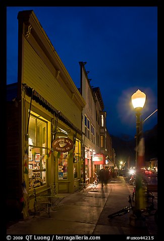 Coffee shop and sidewalk by night. Telluride, Colorado, USA