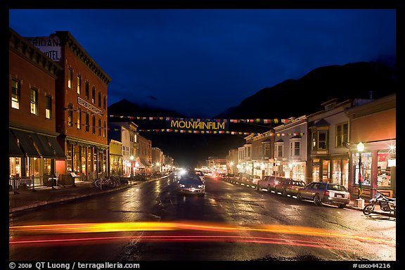 Colorado Street by night with Mountainfilm banner. Telluride, Colorado, USA (color)