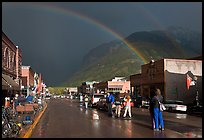 Double rainbow and dark sky over main street. Telluride, Colorado, USA