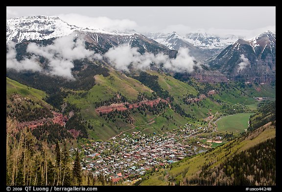 Box canyon surrounded by snowy mountains in spring. Telluride, Colorado, USA