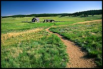 Trail and historic barns,  Florissant Fossil Beds National Monument. Colorado, USA (color)