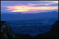 Lights of Grand Junction at dawn. Colorado National Monument, Colorado, USA ( color)