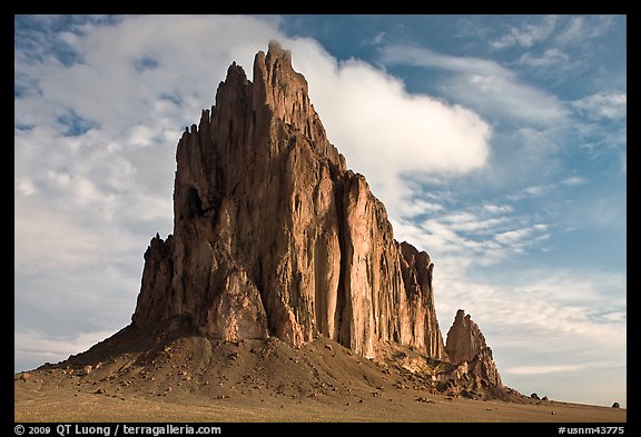 Shiprock with top embraced by cloud. Shiprock, New Mexico, USA