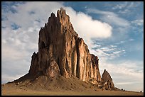 Shiprock with top embraced by cloud. Shiprock, New Mexico, USA (color)