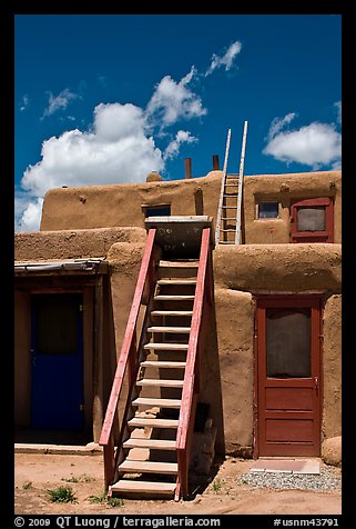 Ladder used to access upper floor of pueblo. Taos, New Mexico, USA (color)