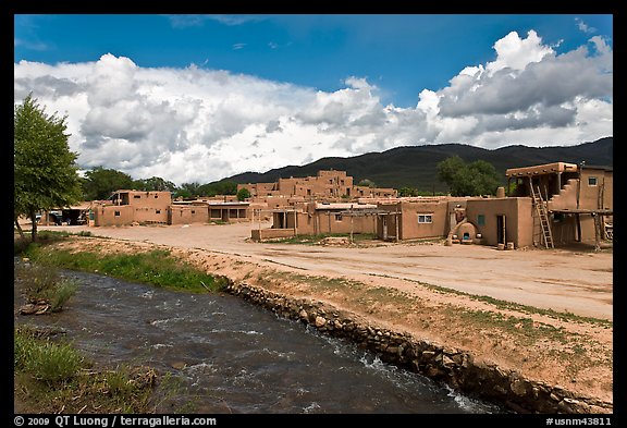 Rio Pueblo stream and pueblo village. Taos, New Mexico, USA