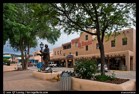 Plazza, statue, and hotel La Fonda. Taos, New Mexico, USA