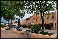 Plazza, statue, and hotel La Fonda. Taos, New Mexico, USA