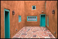 Courtyard and adobe walls. Taos, New Mexico, USA