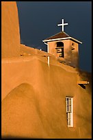 San Francisco de Asisis church under stormy sky. Taos, New Mexico, USA