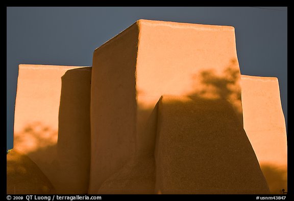 Massive adobe walls and buttresses of San Francisco de Asisis church, Rancho de Taos. Taos, New Mexico, USA (color)
