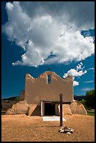 Adobe church and clouds, Picuris Pueblo. New Mexico, USA