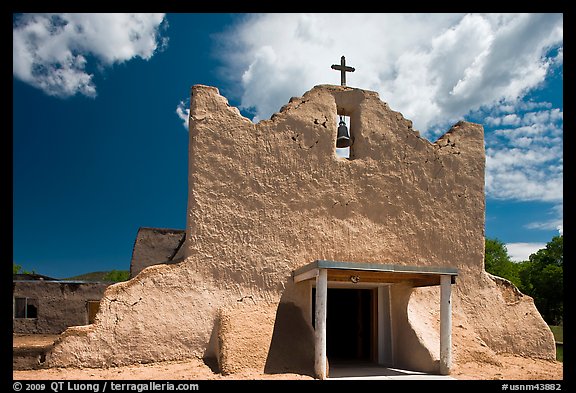 Facade of church covered with tightly compacted earth, clay, and straw, Picuris Pueblo. New Mexico, USA