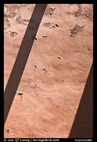 Diagonal shadows on adobe wall, San Jose de Gracia Church. New Mexico, USA