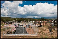 Cemetery and clouds, Truchas. New Mexico, USA