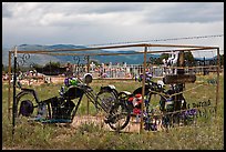 Grave with motorbikes, Truchas. New Mexico, USA ( color)