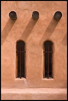 Vigas and deep windows in pueblo style, Sanctuario de Chimayo. New Mexico, USA