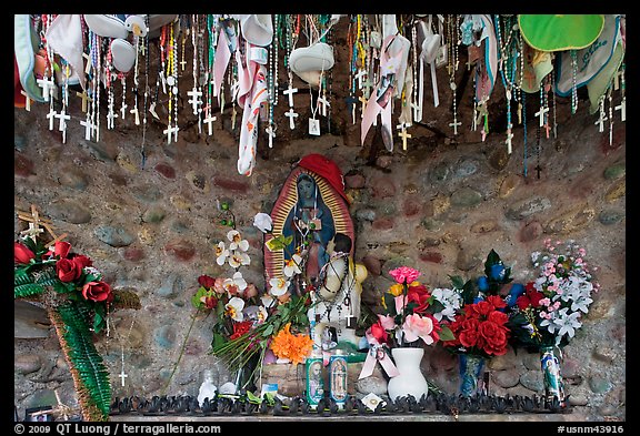 Niche with popular worship objects, Sanctuario de Chimayo. New Mexico, USA