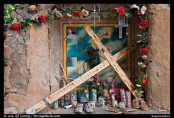 Niche with miscellenous ex-votoes, Sanctuario de Chimayo. New Mexico, USA