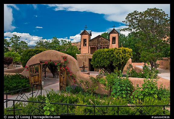 Gardens and walled courtyard, Sanctuario de Chimayo. New Mexico, USA (color)