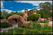 Gardens and walled courtyard, Sanctuario de Chimayo. New Mexico, USA