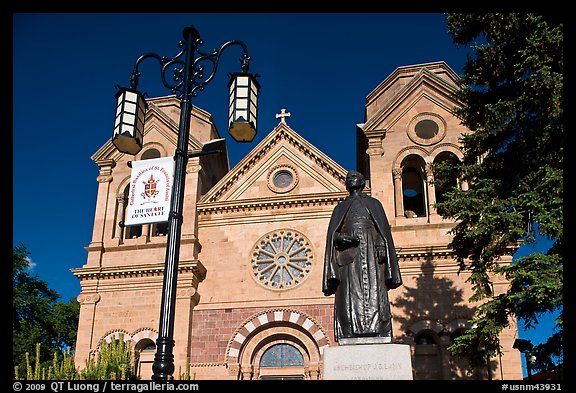 Front of St Francis Cathedral and Archibishop Lamy statue. Santa Fe, New Mexico, USA (color)