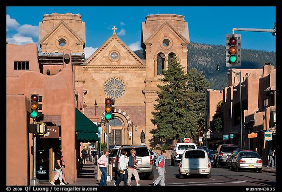 Pedestrians and street with cathedral, downtown. Santa Fe, New Mexico, USA