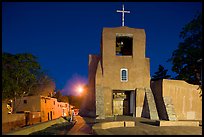 Oldest church and house in the US by night. Santa Fe, New Mexico, USA