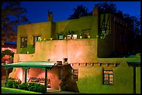 House in Spanish pueblo revival style by night. Santa Fe, New Mexico, USA