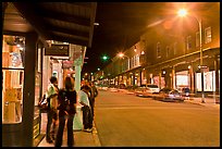 People in historic district by night. Santa Fe, New Mexico, USA