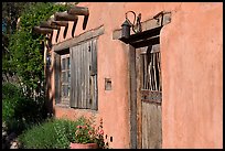 Door, window, and vigas (wooden beams). Santa Fe, New Mexico, USA (color)