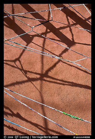 Shadows of vigas (wooden beams) and strings made of plastic bags. Santa Fe, New Mexico, USA