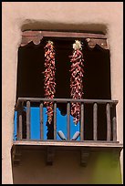 Ristras hanging from tower. Santa Fe, New Mexico, USA