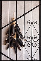 Dried black corn and ironwork. Santa Fe, New Mexico, USA (color)