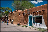 Tourists inspect oldest house. Santa Fe, New Mexico, USA (color)