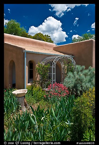 Garden and adobe house. Santa Fe, New Mexico, USA