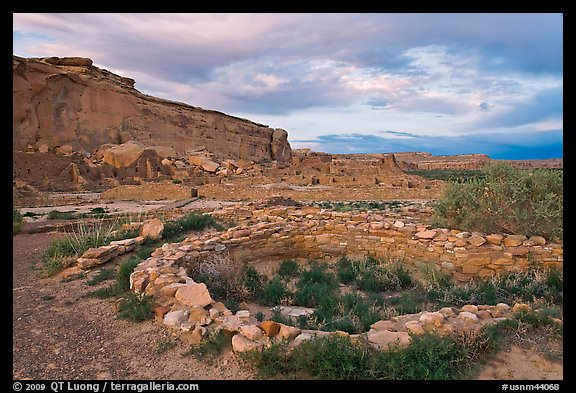 Great Kiva and cliff at sunset, Pueblo Bonito. Chaco Culture National Historic Park, New Mexico, USA (color)